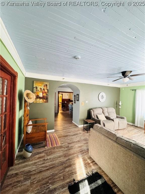 living room featuring ceiling fan, wood ceiling, crown molding, and hardwood / wood-style floors