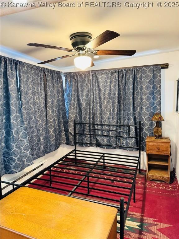 bedroom featuring ceiling fan