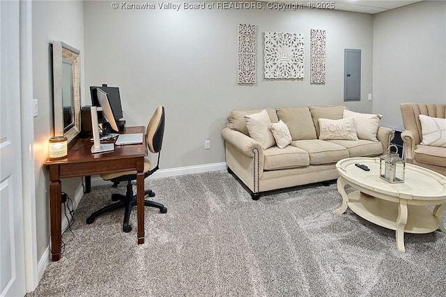 carpeted home office with a paneled ceiling and electric panel