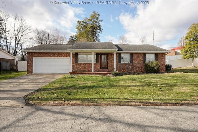 single story home with a front yard and a garage