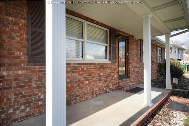 view of patio featuring a porch