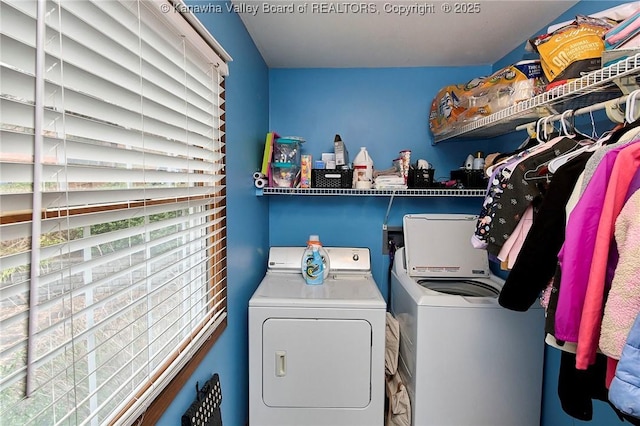 washroom featuring independent washer and dryer