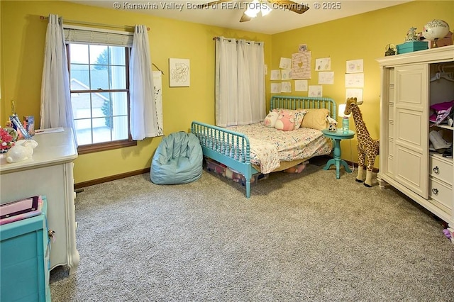 carpeted bedroom featuring ceiling fan