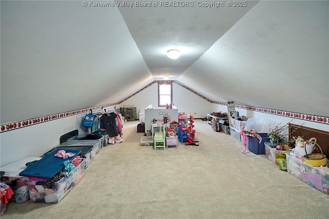 rec room with lofted ceiling and carpet