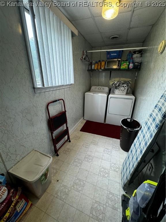 laundry room with washing machine and dryer