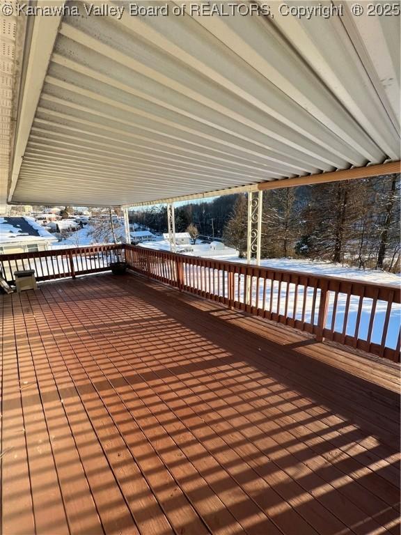 view of snow covered deck