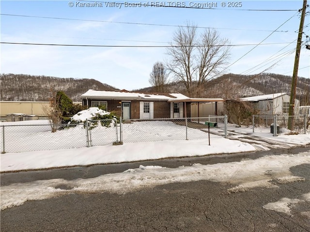 view of front of house with a mountain view