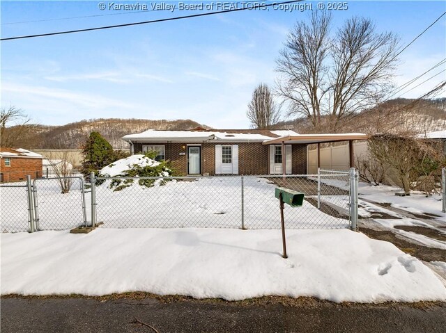 view of front of property with a mountain view