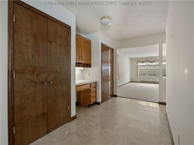 hallway with a baseboard radiator