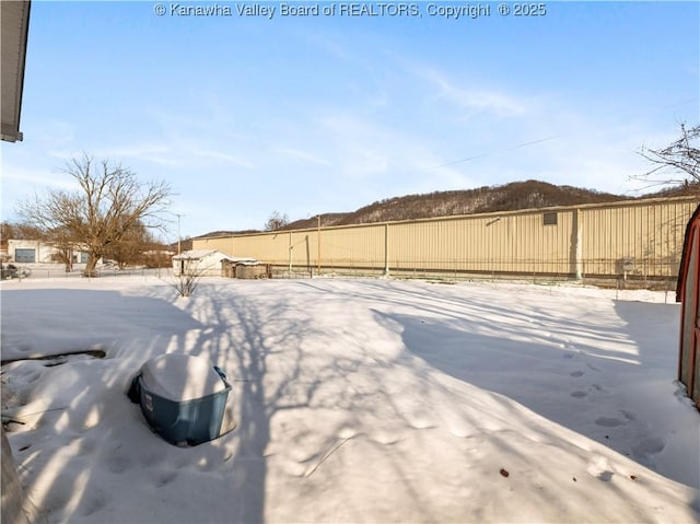 view of snowy yard