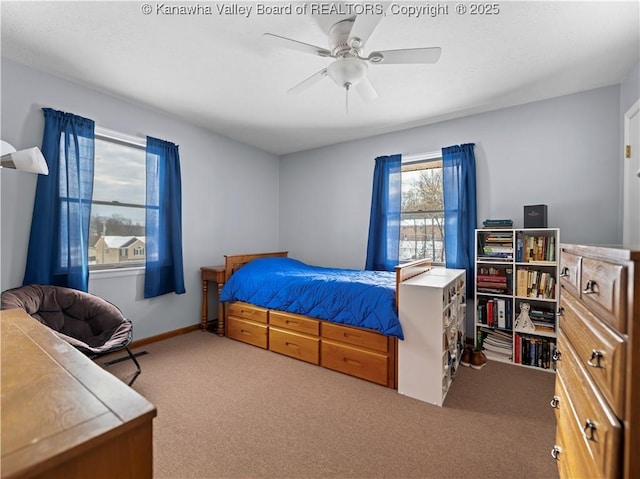 carpeted bedroom featuring ceiling fan