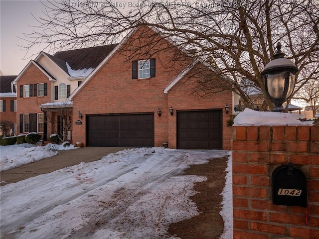 view of front of property with a garage