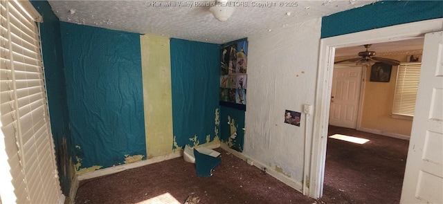 bedroom featuring a textured ceiling