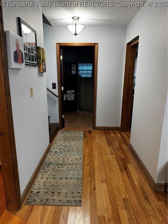 hallway featuring hardwood / wood-style floors