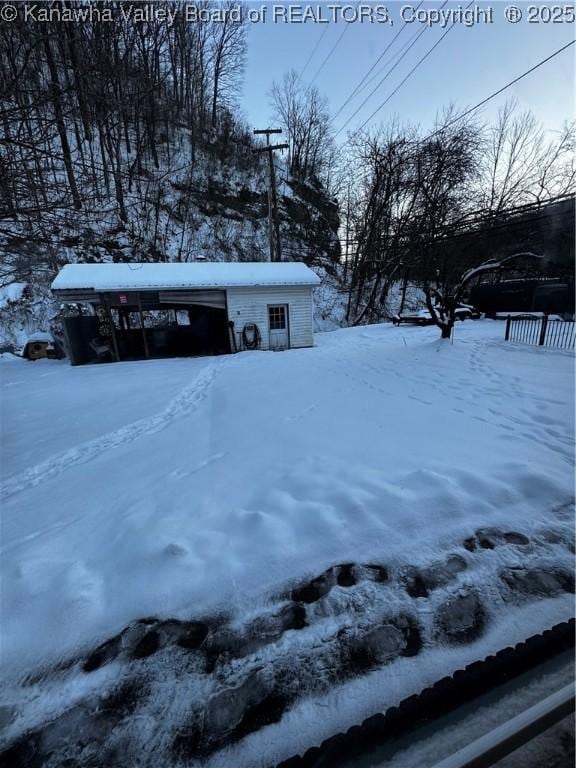 view of snowy yard