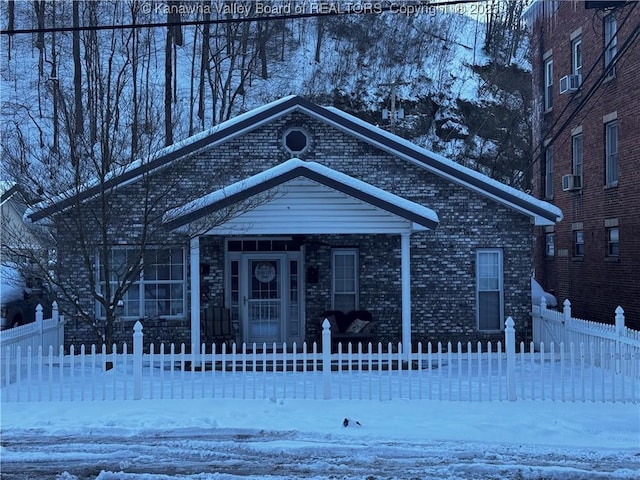 view of front facade with cooling unit