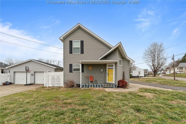 view of front property featuring a garage and a front yard