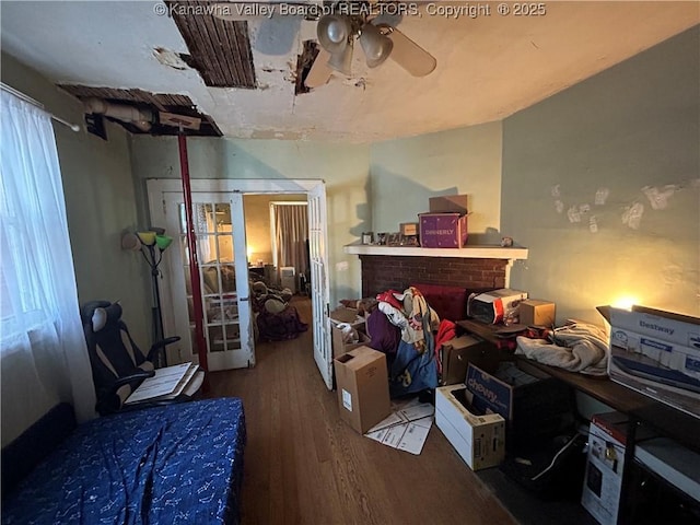 bedroom with hardwood / wood-style floors