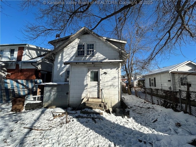 view of snow covered property