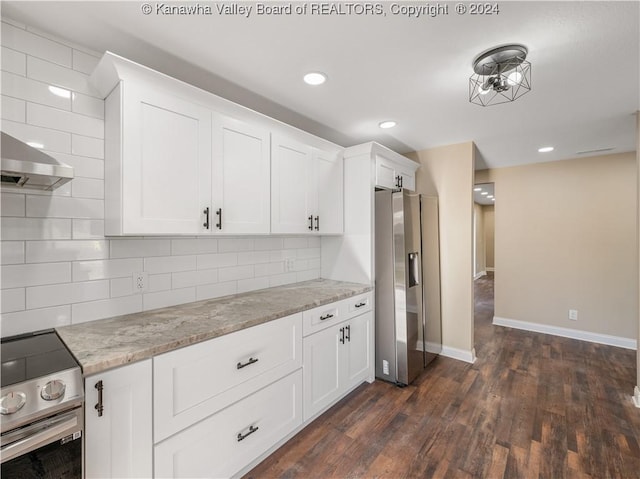 kitchen with tasteful backsplash, dark hardwood / wood-style floors, white cabinetry, appliances with stainless steel finishes, and light stone counters