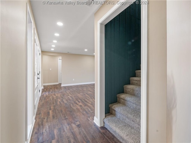 staircase featuring hardwood / wood-style floors