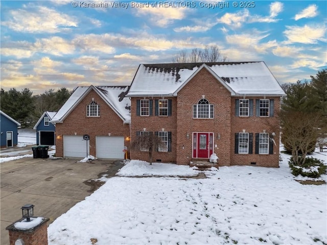 colonial-style house with a garage