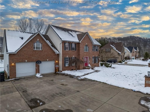 view of front of home with a garage