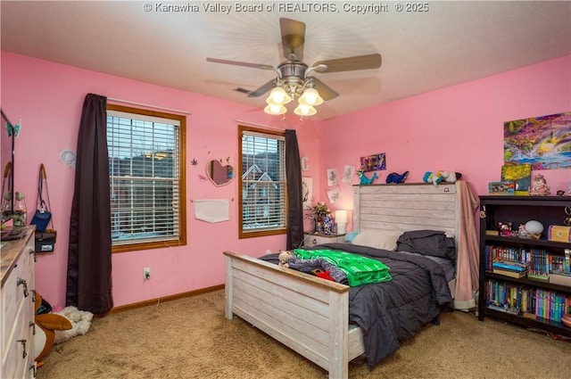 bedroom featuring ceiling fan and light colored carpet