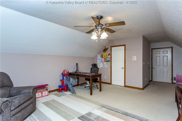 office area with ceiling fan, light colored carpet, a textured ceiling, and lofted ceiling