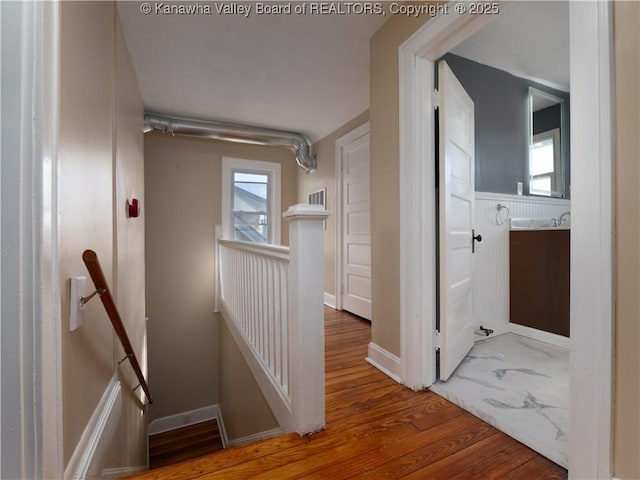 hall featuring hardwood / wood-style flooring