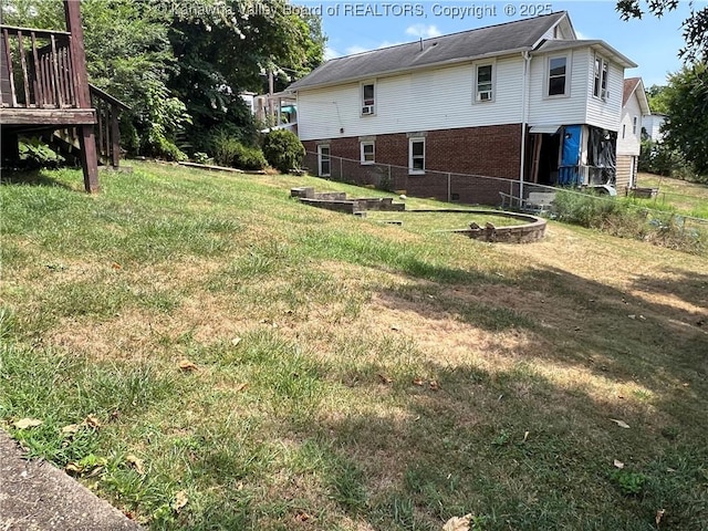 view of yard featuring a wooden deck