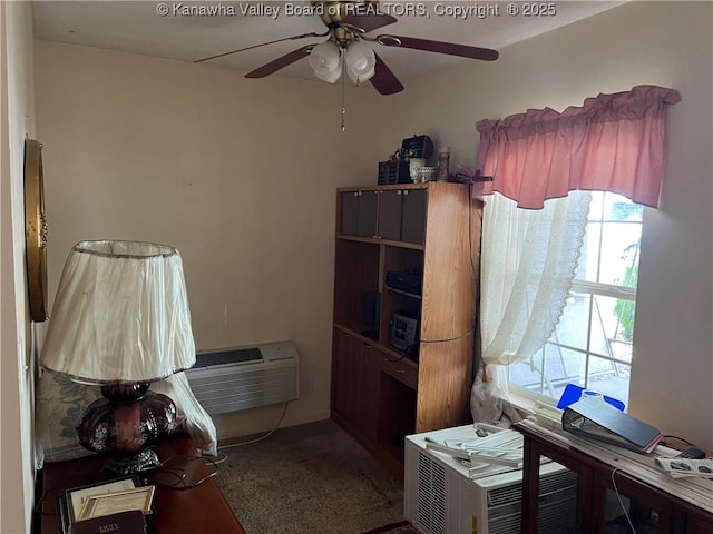 interior space with ceiling fan and a wall mounted AC