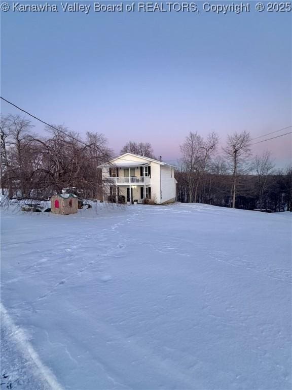 view of yard covered in snow