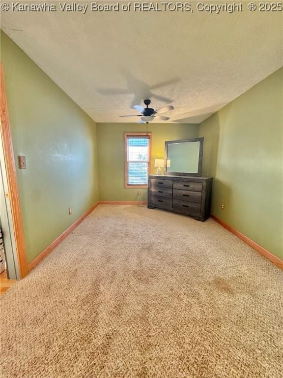 unfurnished bedroom featuring carpet