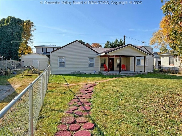 view of front of house with covered porch and a front lawn