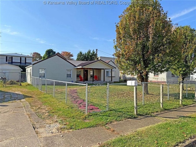 view of front facade with a front lawn and a porch