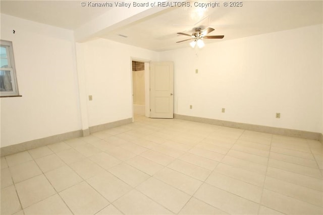 unfurnished room featuring ceiling fan and light tile patterned flooring