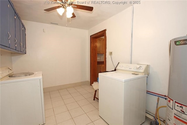 clothes washing area featuring cabinets, light tile patterned floors, water heater, and ceiling fan