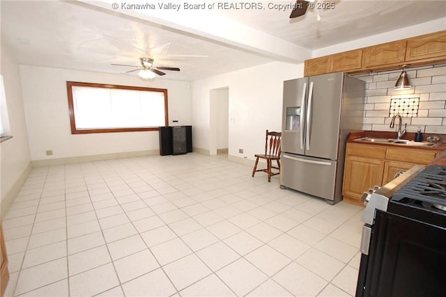 kitchen with sink, ceiling fan, black range with electric stovetop, stainless steel refrigerator with ice dispenser, and light tile patterned flooring