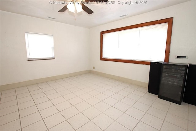 unfurnished room featuring ceiling fan