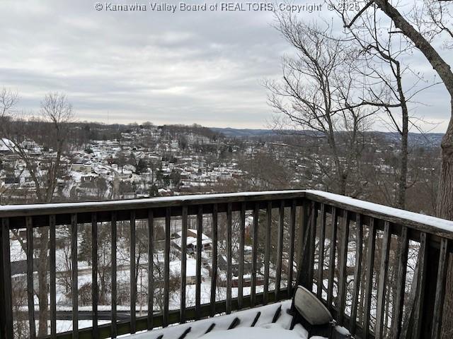 view of snow covered deck