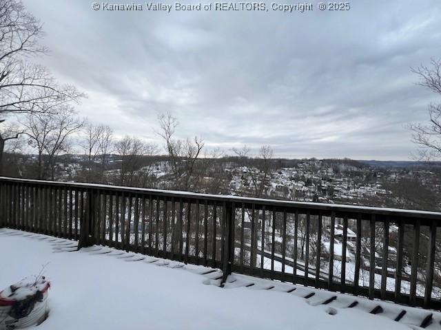 view of snow covered deck