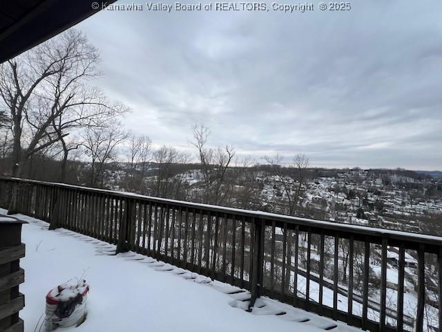 view of snow covered deck