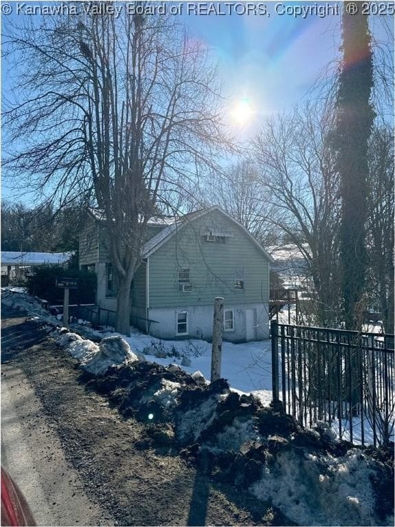 view of snow covered property