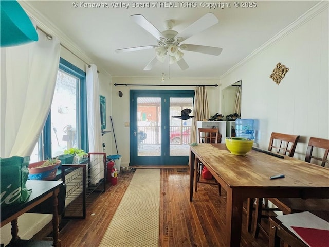 dining space featuring ceiling fan, dark hardwood / wood-style floors, ornamental molding, and french doors