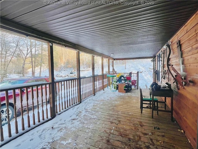 view of snow covered deck