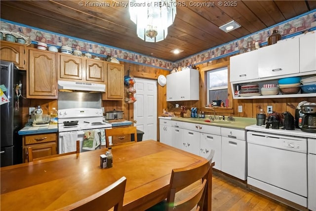 kitchen with sink, wood ceiling, white appliances, light hardwood / wood-style floors, and white cabinets