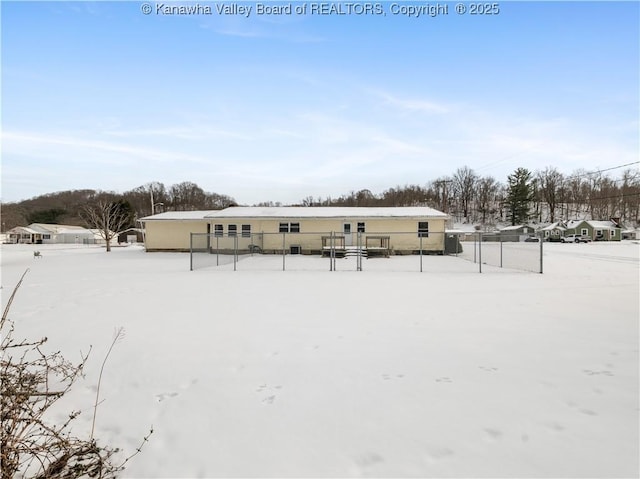 view of snow covered house