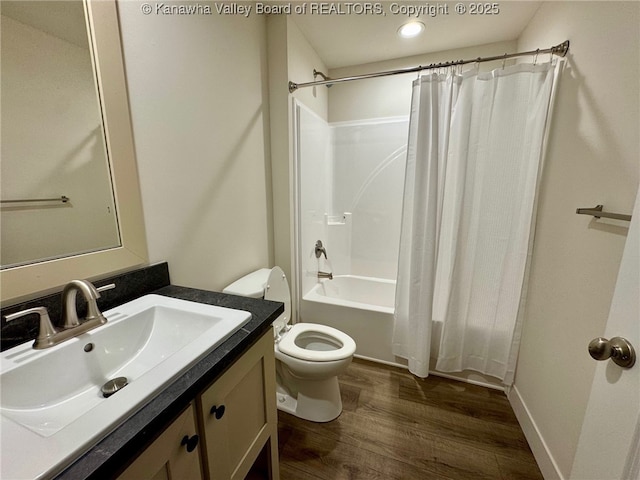 full bathroom with shower / bath combination with curtain, wood-type flooring, toilet, and vanity