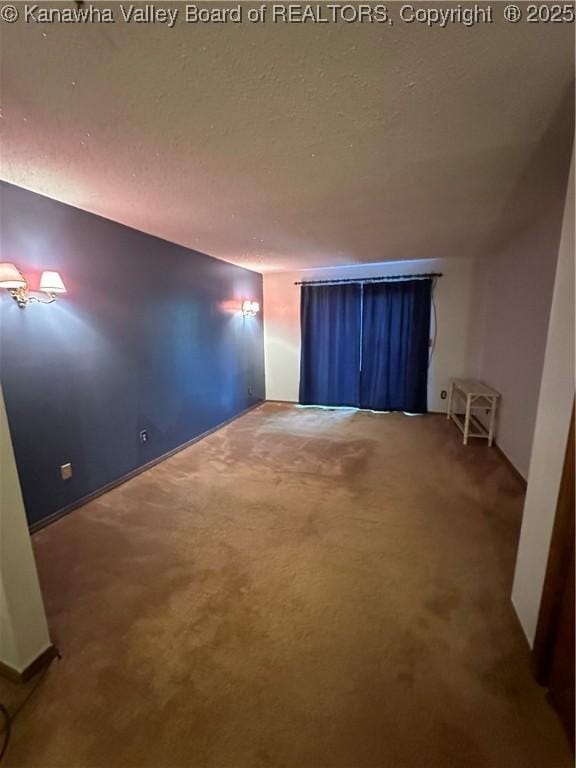 empty room featuring carpet